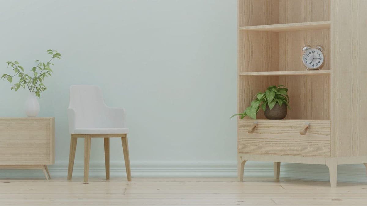 A workshop wall combining a closed cabinet and open shelving