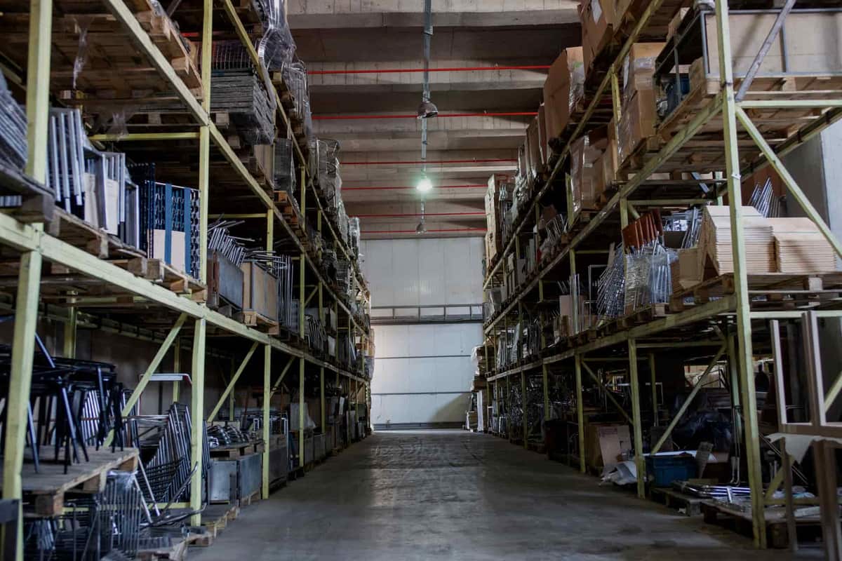 Industrial pallet racking with steel beams in a warehouse