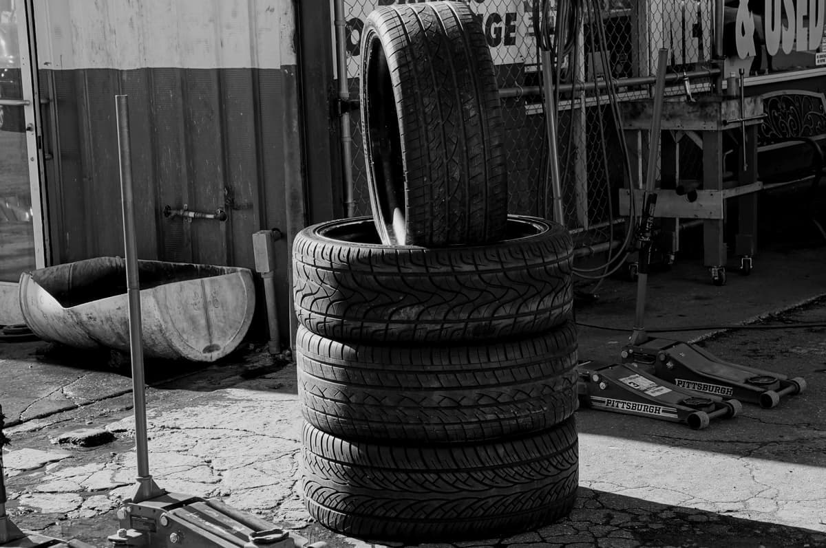 Stacked vehicle tires in a garage
