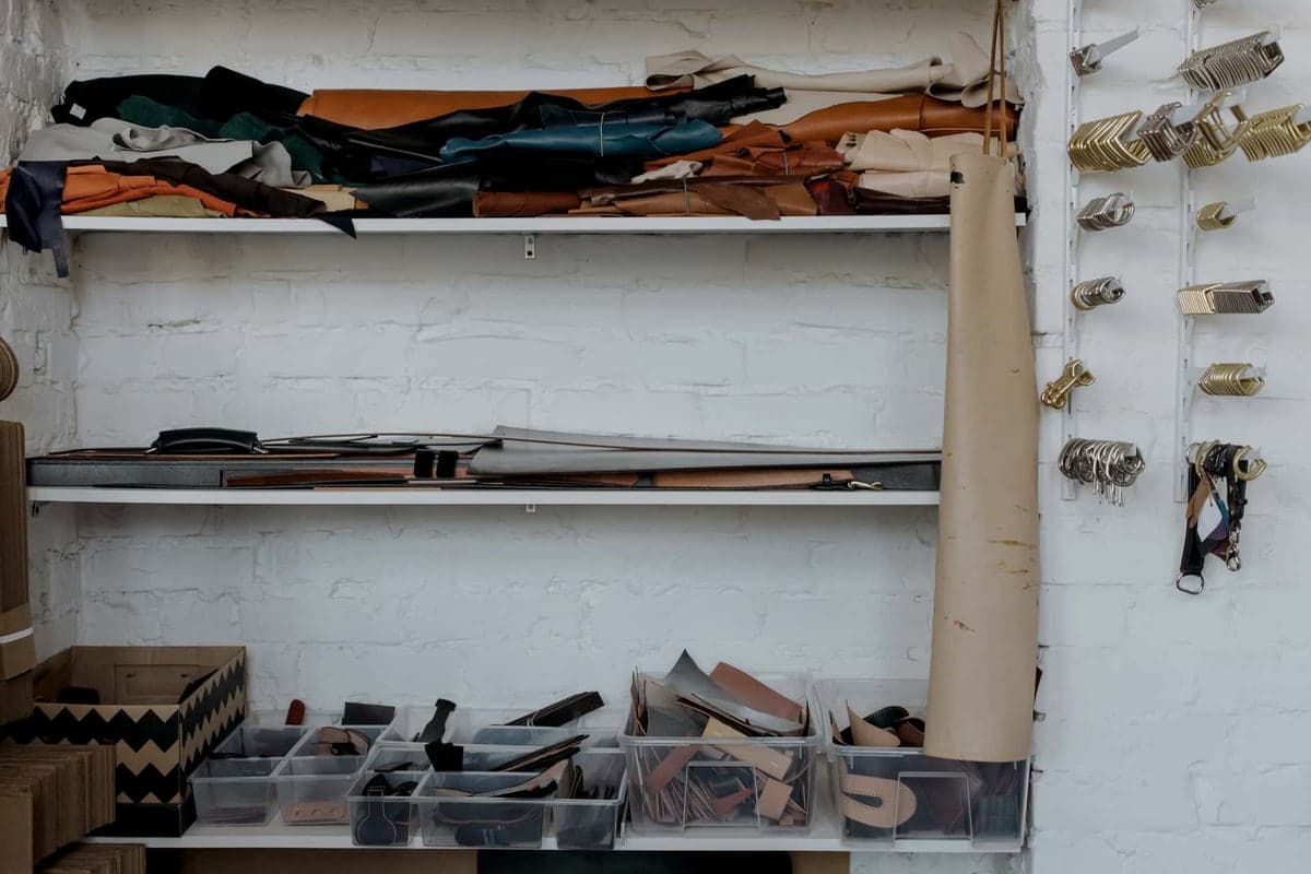 An organized workshop wall with tools arranged in tidy rows